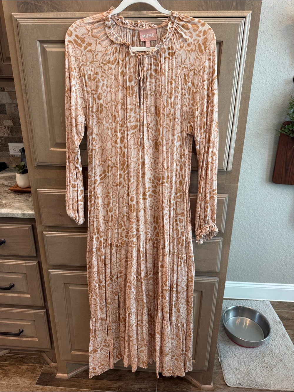 Tan/peach Show me your MuMu maxi dress.  Super cute and flowy!